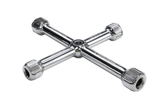 Chrome four-way wrench tool isolated on black background