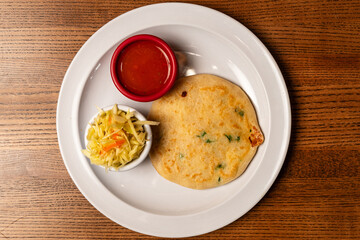 Salvadoran flat bread with salsa