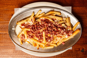French fries with cheese and bacon