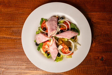 Chef salad in a white bowl