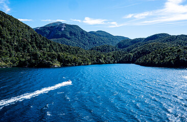 bright blue water scenery views from cruise ship idyllic milford sound fiordland national park new...