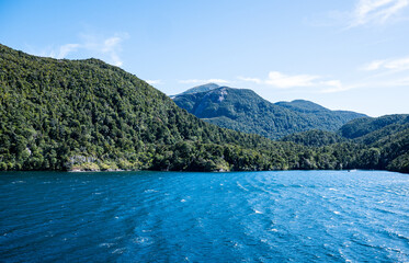 bright blue water scenery views from cruise ship idyllic milford sound fiordland national park new...