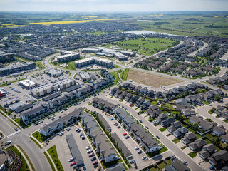 Residential area with many houses and a few cars