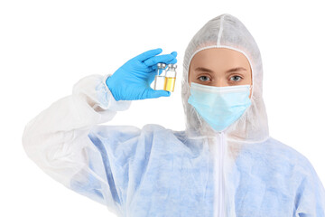 Medical worker in protective suit and with ampules on white background. Vaccination concept