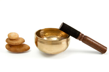 Tibetan singing bowl and zen stones for meditation and sound healing.