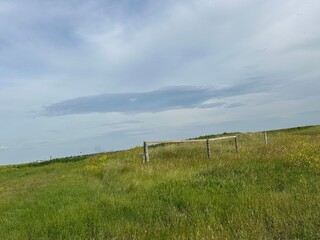 Farmland Hills with Fencing and Wide Horizon
