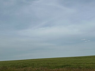 Rustic Agricultural Farmland Under Dramatic Skies in Alberta