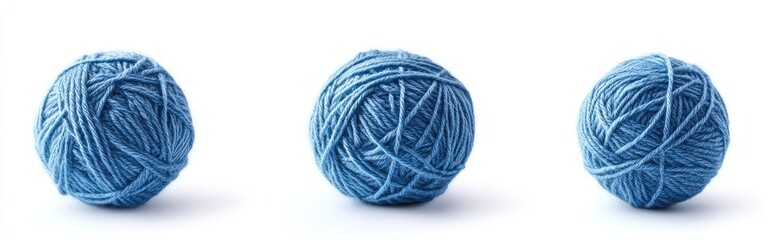 Three balls of light-blue yarn on white background