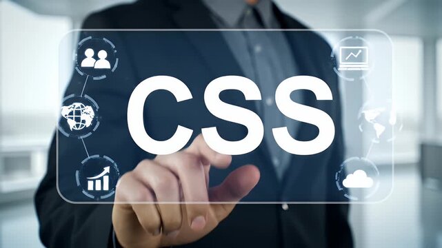 Man in Dark Blue Suit Touches Screen with CSS Text and Network Icon in White Background During Conference Meeting with Light Bright Illumination