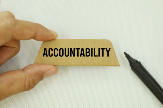 Wooden puzzle with the word ACCOUNTABILITY. concept of responsibility. responsibility for one's actions and decisions and being accountable for their outcomes