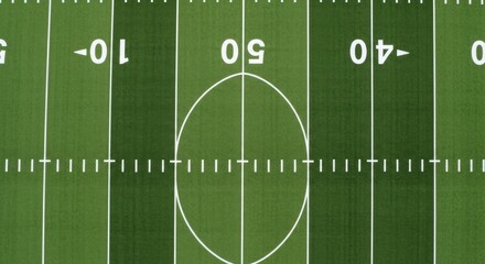 An Overhead View of an American Football Field Showing Yard Markers and the Center Circle