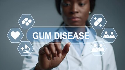 African American Doctor Tapping Gum Disease Concept on Virtual Screen with Icons in a Health and Medicine Setting against Gray Backdrop - Powered by Adobe