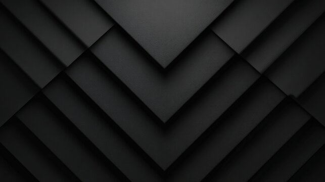 Abstract grayscale image featuring a pattern of overlapping, dark-grey, triangular shapes creating a chevron or V-shaped design with subtle shadowing and depth