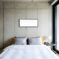 Modern bedroom with a minimalist aesthetic featuring a comfortable bed with grey pillows against a textured concrete wall and a large window