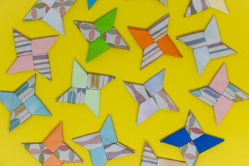 A collection of colorful origami ninja stars, perfect for creative projects, educational materials, and Japanese culture-themed designs.