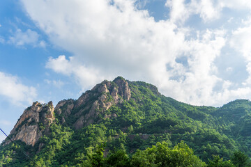 mountain landscape with blue sky and clouds