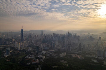 first light of dawn breaks over Kuala Lumpur