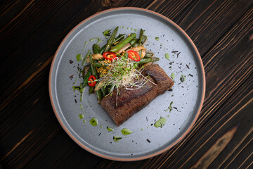 Grilled Steak with Vegetables and Sauce