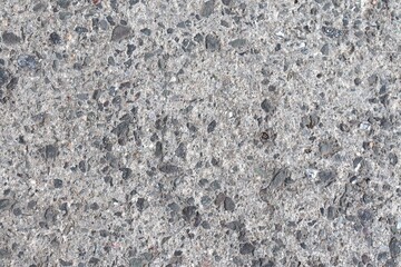 Texture of stone and material for sidewalk.  A close-up of textured sidewalk and construction industry. 