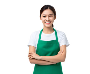 A cheerful helpful young Asian woman wearing a green apron stands with a welcoming expression ready to assist customers in a retail or hospitality setting