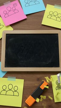Employee Assistance Program message on mini chalkboard with colorful sticky notes showing employee icons, symbolizing workplace wellbeing, support, and HR mental health initiatives.