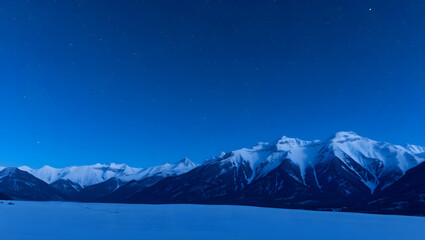 Mountain Majesty – Snowy peaks under a starry night