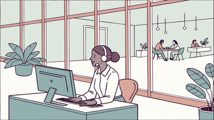 Businesswoman working on a computer at her office desk