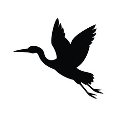 Silhouette of a heron in flight