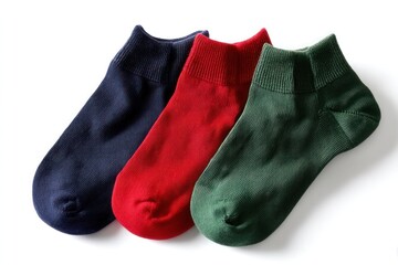 Flat Lay of Kids' Ankle Socks in Solid Primary School Colors on White Background

