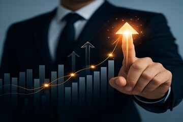 Businessman s finger points to a glowing upward arrow superimposed over a financial stock market bar graph chart