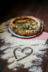 pizza on a wooden table