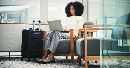 Airport, woman and laptop for business trip, communication or email for travel plans research....