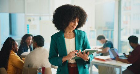 Woman, professor and students with tablet in class for education, learning and knowledge. Teacher,...