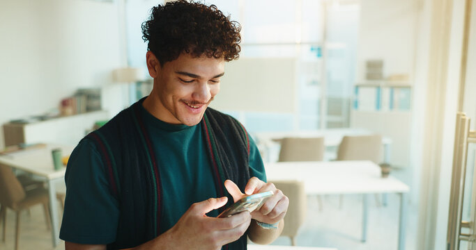 Education, student and happy man with phone in university classroom for course information. Mobile, college and person with app to check schedule for learning, development and email for scholarship