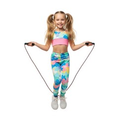 A cheerful young girl in colorful activewear joyfully jumping rope, embodying childhood fitness and energy. Ideal for health, active lifestyle, and sports content.