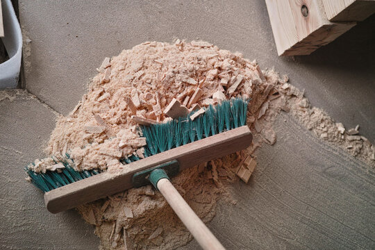 sweeping wooden chips