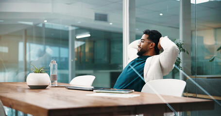 Businessman, relax and done with break in office for project completion, accounting or done. Man,...