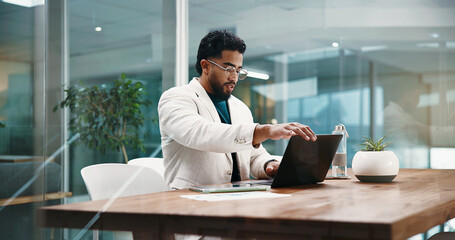 Businessman, laptop and reading for planning, feedback and schedule in office. Employee, HR manager...
