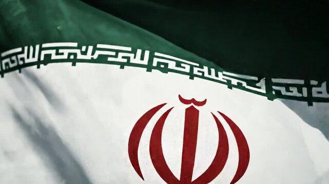 Closeup of a waving Iranian flag
