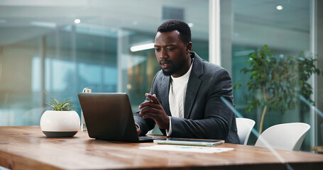 Worried, employee and man with laptop in office, accountant and mistake on financial report and...