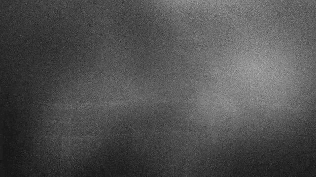 Background loop animation,Textures and grain for grungy and grime effect.4k black grunge gritty abstract background