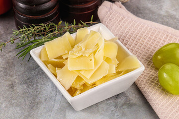 Parmesan cheese slices in the bowl