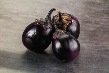 Raw violet and black eggplant