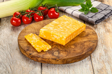Marble yellow cheese with slices