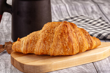 Fresh hot homemade croissant for breakfast