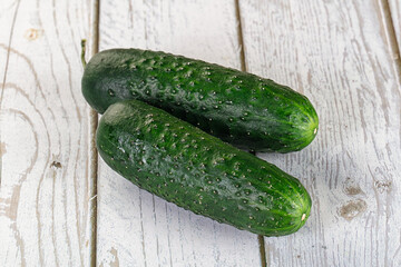 Ripe green raw two cucumbers