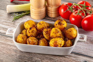 Baked small baby potato with herbs