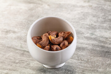 Unpeeled cashew nuts in the bowl
