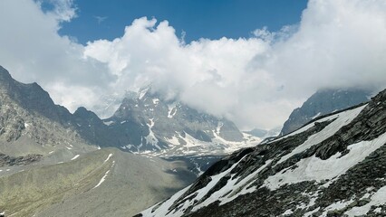 Manimahesh Kailash Peak Beneath Blue Skies in clouds