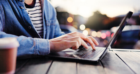 Hands, laptop and typing with person at coffee shop for remote work or small business research....